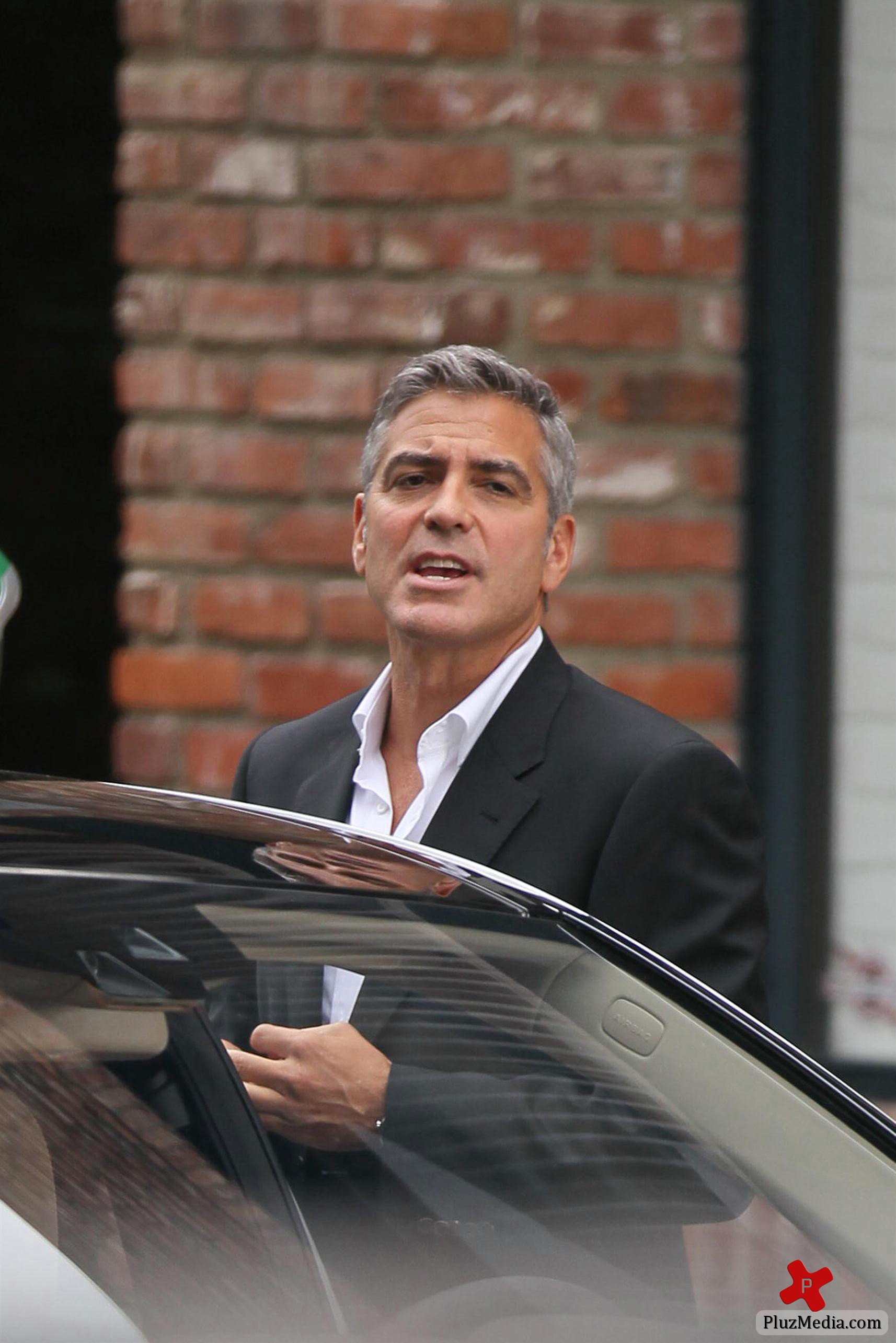 George Clooney on the set of a Mercedes Benz E300 L advert photos | Picture 78326